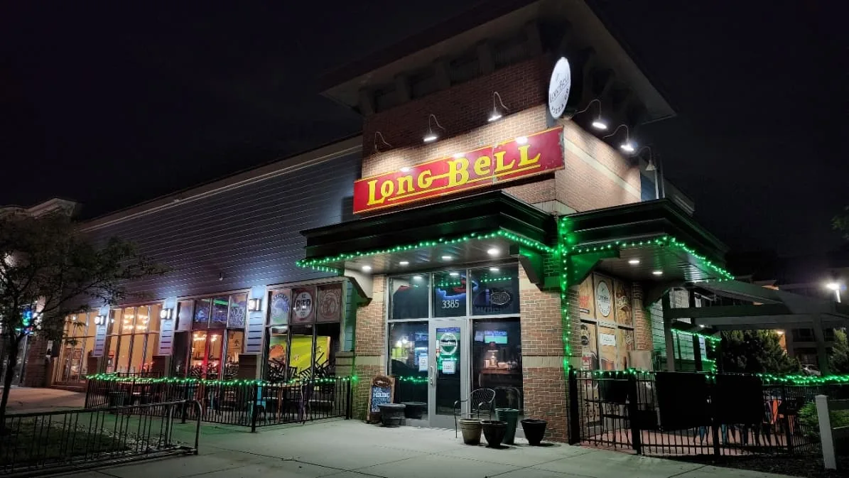 The Long-Bell Pizza Co. storefront at night